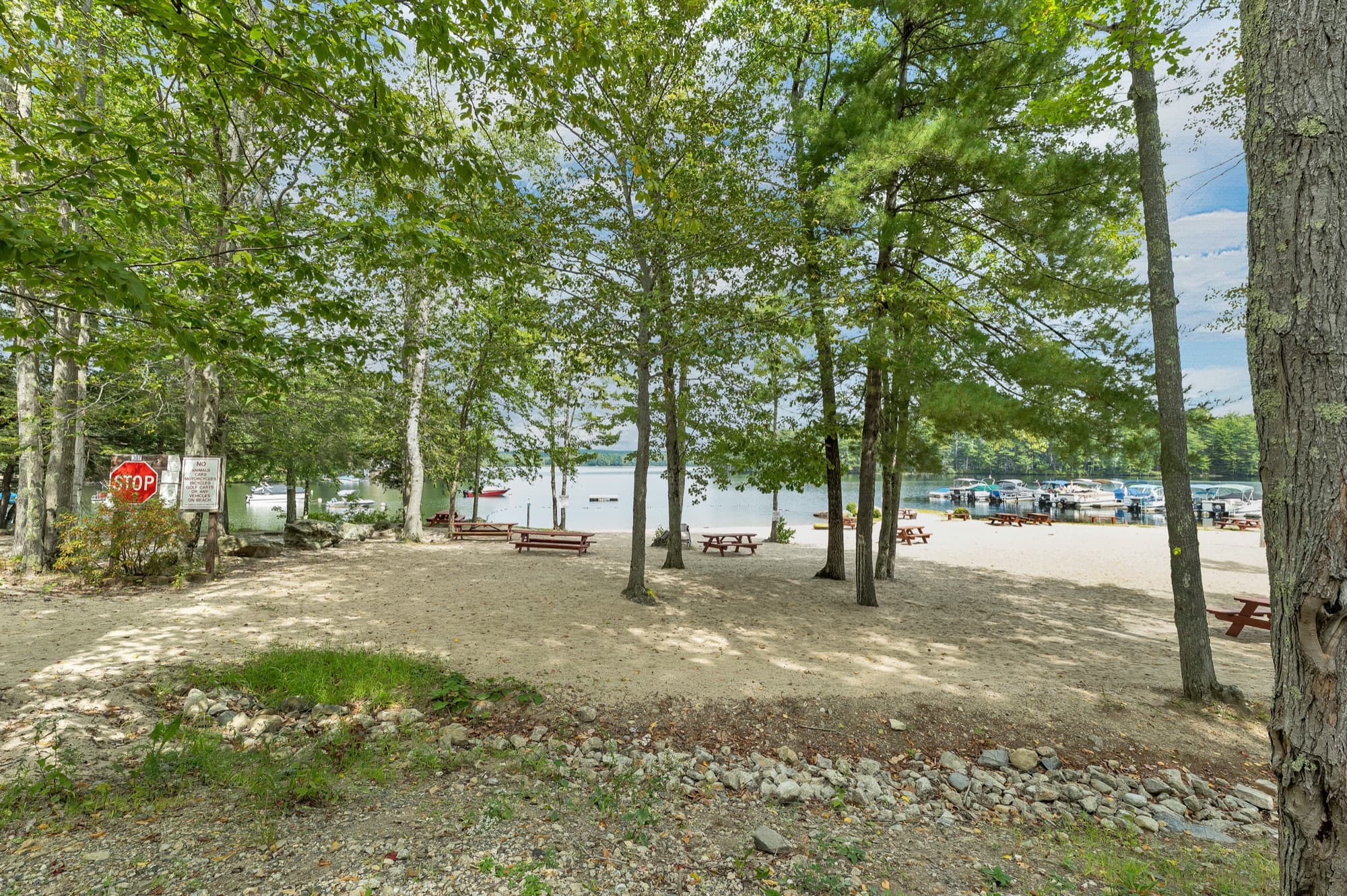 The community beach on Baxter Lake, with the boat ramp and docks